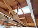 Exposed ceiling beams inside the garage; showcasing the structure and potential for customization at 1757 W Argon St, Mesa, AZ 85201