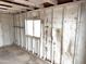Spacious garage interior ready to be optimized for storage or a workshop, with a window for natural light at 1757 W Argon St, Mesa, AZ 85201