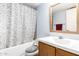 Bathroom featuring a combination bathtub and shower, and a vanity with a mirror at 1920 W Lindner Ave # 249, Mesa, AZ 85202