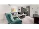 Comfortable living room featuring a plush sectional sofa and a cozy armchair at 1920 W Lindner Ave # 249, Mesa, AZ 85202