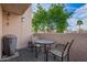 Cozy patio with a table and chairs, perfect for outdoor relaxing at 1920 W Lindner Ave # 249, Mesa, AZ 85202