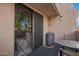 Relaxing patio featuring a glass-topped table and outdoor seating at 1920 W Lindner Ave # 249, Mesa, AZ 85202