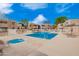 Relaxing pool area with lounge chairs and beautifully maintained landscaping at 1920 W Lindner Ave # 249, Mesa, AZ 85202