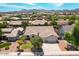 Beautiful aerial shot of single-Gathering home in a quiet suburban neighborhood with mountain views at 20329 E Bronco Dr, Queen Creek, AZ 85142
