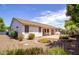 Back view of home with a large backyard at 20329 E Bronco Dr, Queen Creek, AZ 85142