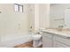 Full bathroom with a shower-tub combo, granite vanity top and updated fixtures at 20329 E Bronco Dr, Queen Creek, AZ 85142