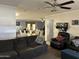 Spacious living room with sofa, connecting to the dining area, creating a seamless and connected living space at 216 N 88Th St, Mesa, AZ 85207