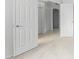 Hallway showing an open doorway with neutral carpet at 2503 S Tambor --, Mesa, AZ 85209