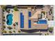 Stunning aerial shot showcasing the private backyard pool and solar panels on the roof of this beautiful home at 27621 N 174Th Dr, Surprise, AZ 85387
