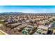 Desirable community featuring homes with pools, solar panels, and mountain views in the distance at 27621 N 174Th Dr, Surprise, AZ 85387