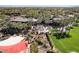 Expansive aerial view of manicured grounds with a pool and a grand building at 29192 N 129Th Ave, Peoria, AZ 85383