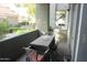 Comfortable, covered patio with table, chairs, and outdoor setting at 2929 W Yorkshire Dr # 1028, Phoenix, AZ 85027