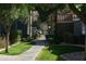 Exterior view of walkway surrounded by lush, green landscaping at 2929 W Yorkshire Dr # 1028, Phoenix, AZ 85027