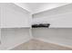 Practical walk-in closet with built-in shelving and ample storage space at 30056 N 129Th Ave, Peoria, AZ 85383