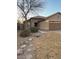 Charming single-story home with a two car garage and low-maintenance landscaping at 32974 N Sandstone Dr, San Tan Valley, AZ 85143