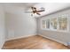 Bedroom with hardwood floors, crown molding, natural lighting and white trim at 4623 E Pinchot Ave, Phoenix, AZ 85018