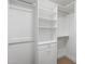 Walk in closet features shelving and rack for optimal storage at 4623 E Pinchot Ave, Phoenix, AZ 85018