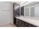 Bathroom featuring a dark vanity with a stone countertop at 4808 N 24Th St # 925, Phoenix, AZ 85016