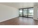 Spacious bedroom with large windows offering scenic city views and ample natural light at 4808 N 24Th St # 925, Phoenix, AZ 85016