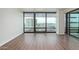 Bright bedroom with expansive windows providing stunning city views and abundant natural light at 4808 N 24Th St # 925, Phoenix, AZ 85016