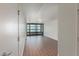 Bright living room featuring wood floors and access to a balcony with beautiful views at 4808 N 24Th St # 925, Phoenix, AZ 85016