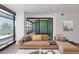 Modern living room with stylish furniture and a sliding glass door leading to the balcony at 4808 N 24Th St # 925, Phoenix, AZ 85016