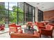 Inviting lobby boasts comfortable lounge chairs, stylish decor, and scenic outdoor views at 4808 N 24Th St # 925, Phoenix, AZ 85016