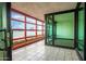Enclosed balcony with tile flooring and modern architectural details at 4808 N 24Th St # 925, Phoenix, AZ 85016