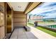 Exclusive rooftop deck boasts city views, artificial grass, and modern seating and planters at 4808 N 24Th St # 925, Phoenix, AZ 85016
