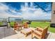 Inviting rooftop deck with grilling area, comfy wood lounge seating, and endless skyline views at 4808 N 24Th St # 925, Phoenix, AZ 85016