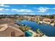 Aerial view of luxury homes on canal with pools at 4862 S Jojoba Way, Chandler, AZ 85248