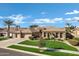 Beautiful single-story home with a well-manicured lawn and desert landscaping at 4862 S Jojoba Way, Chandler, AZ 85248