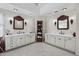 Spacious bathroom featuring dual vanities with marble countertops and custom mirrors at 5478 E Oakhurst Way, Scottsdale, AZ 85254