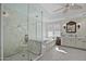 Luxurious bathroom with marble walk-in shower, soaking tub, and elegant fixtures at 5478 E Oakhurst Way, Scottsdale, AZ 85254