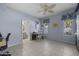 Bright office space with blue walls, a desk area, and an attached bathroom at 5478 E Oakhurst Way, Scottsdale, AZ 85254