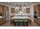 Beautiful kitchen with a large island, pendant lighting, ample cabinet space, and modern appliances at 550 E Aurora Dr, San Tan Valley, AZ 85140