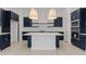 Spacious kitchen featuring navy blue cabinets, center island, and stainless steel appliances at 550 E Aurora Dr, San Tan Valley, AZ 85140