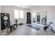 Workout room with exercise bike, yoga mat, and decorative mirrors at 7195 E Rancho Del Oro Dr, Scottsdale, AZ 85266
