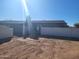 Backyard showing the home exterior in need of landscape renovation at 7617 E Thunderbird Rd, Scottsdale, AZ 85260