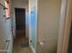 Bathroom featuring walk-in shower, linoleum flooring, and an open concept at 7617 E Thunderbird Rd, Scottsdale, AZ 85260