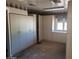 Bedroom featuring wall-to-wall storage cabinets and a window at 7617 E Thunderbird Rd, Scottsdale, AZ 85260