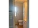 Clean and functional bathroom featuring a toilet, vanity, and storage cabinet at 7750 E Broadway Rd # 212, Mesa, AZ 85208