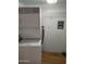 Stacked washer and dryer are featured in the laundry room at 7750 E Broadway Rd # 212, Mesa, AZ 85208