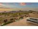 Stunning balcony view overlooking pool, desert landscape, and mountains in the background at 11036 E Evans Rd, Scottsdale, AZ 85255