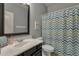 Bathroom with a shower, a sink, and a large mirror at 11036 E Evans Rd, Scottsdale, AZ 85255