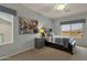 Bedroom featuring a decorative piece, neutral walls, and a window view at 11036 E Evans Rd, Scottsdale, AZ 85255