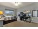 Bedroom with a bed, large window overlooking mountains, and two desks at 11036 E Evans Rd, Scottsdale, AZ 85255