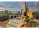 Charming outdoor firepit lounge with comfortable seating at 11036 E Evans Rd, Scottsdale, AZ 85255