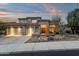 Stunning home featuring a three-car garage and lush landscaping at 11036 E Evans Rd, Scottsdale, AZ 85255