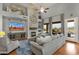 Bright and airy living room featuring a fireplace, hardwood floors, and an open floor plan with views at 11036 E Evans Rd, Scottsdale, AZ 85255